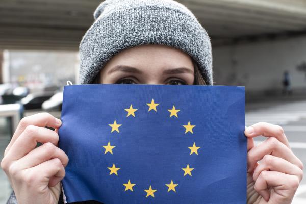 Young people and European flag